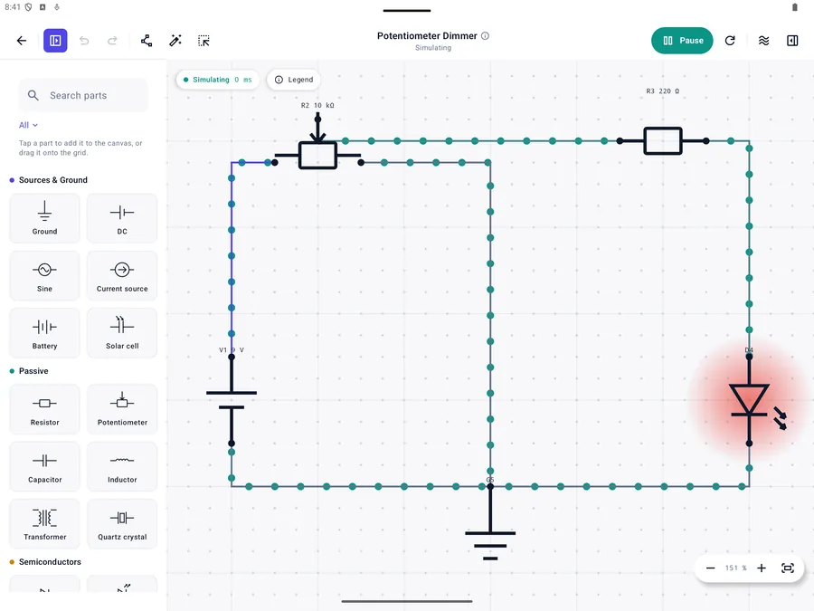 Ohmira on an Android tablet, with the parts palette beside a circuit simulating
